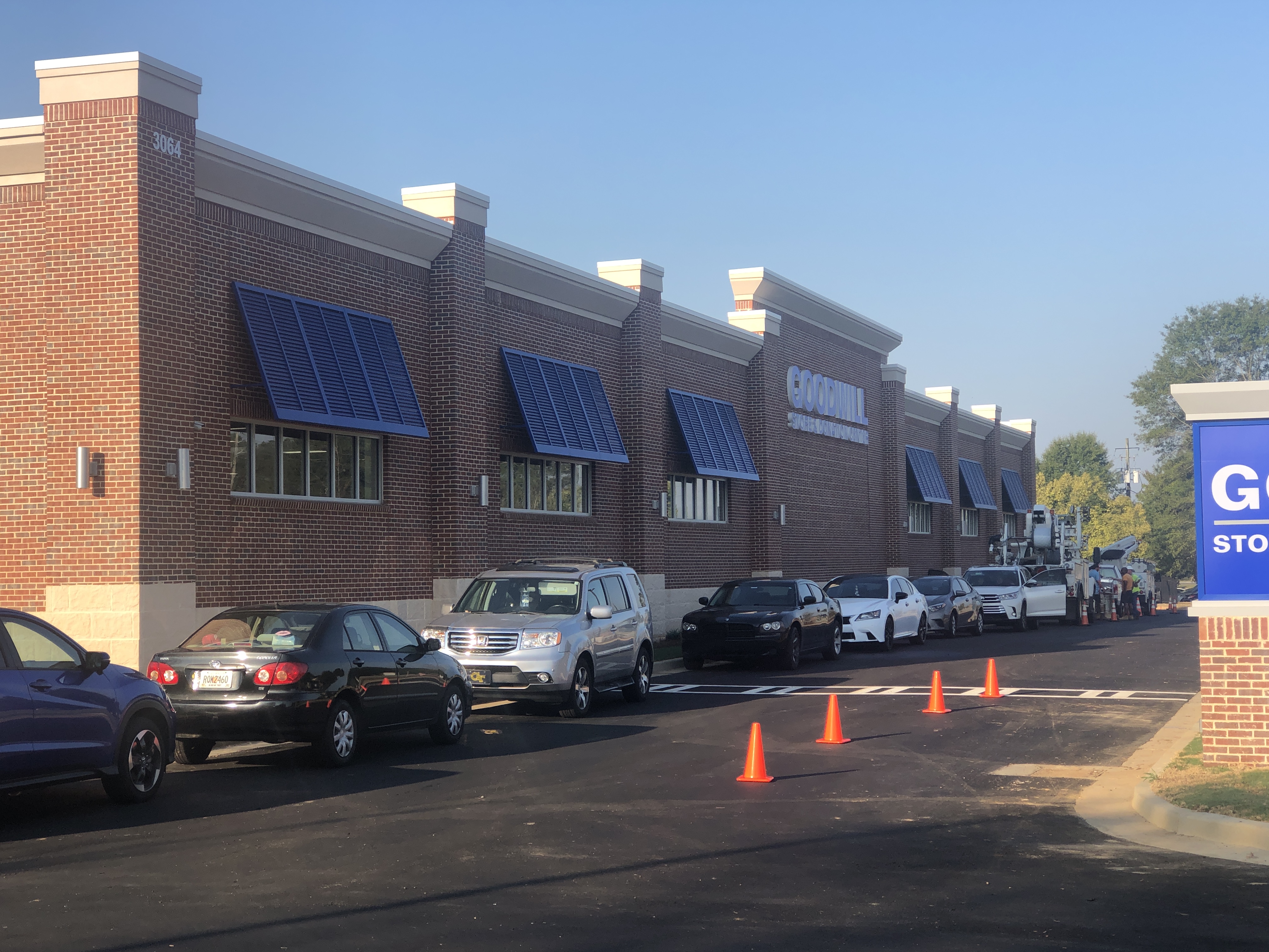 Picture of the side of the store by pylon sign